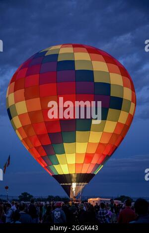 Colorful, illuminated hot air balloon, Albuquerque International Balloon Fiesta, Albuquerque, New Mexico USA Stock Photo