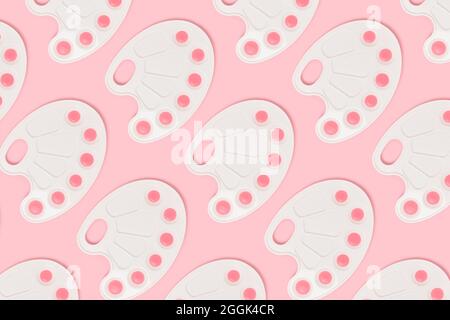 Pattern made of watercolor palettes on a pink pastel background. Artistic concept. Stock Photo