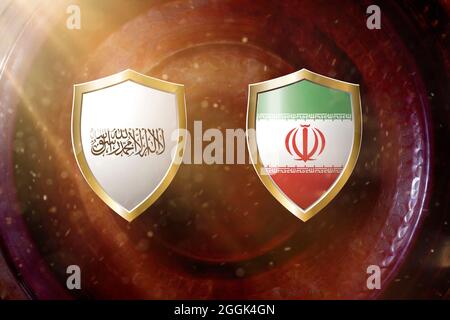 taliban and iran flag in golden shield on copper texture background. Stock Photo