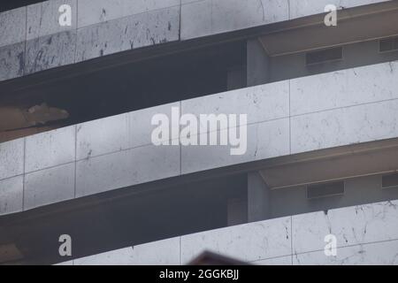 The Milan skyscraper completely burned down after the massive fire of 29 August 2021. Blackened walls and rubble Stock Photo