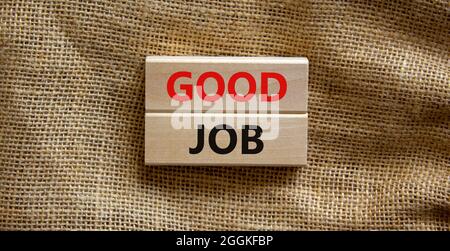 Good job symbol. Concept words 'good job' on wooden blocks on a ...