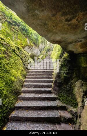 the staircase carved into the rock of Sasso Spicco, La Verna, Franciscan Sanctuary, Chiusi della Verna, Arezzo, Tuscany, Italy Stock Photo