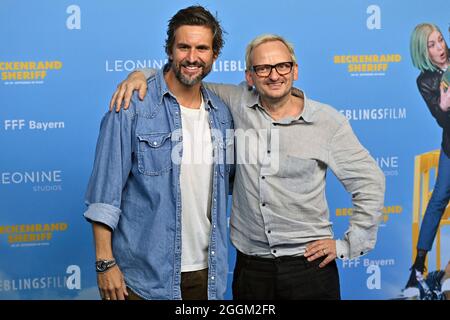 Munich, Deutschland. 01st Sep, 2021. From left: Tom Beck (actor), Milan PESCHEL (actor) Film premiere BECKENRAND SHERIFF on September 1st, 2021. Credit: dpa/Alamy Live News Stock Photo