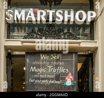 Amsterdam, Netherlands - August 14, 2021: Warmoesstraat. Entrance to Smartshop place to buy magic truffles psychedelics snacks and supplements as the Stock Photo