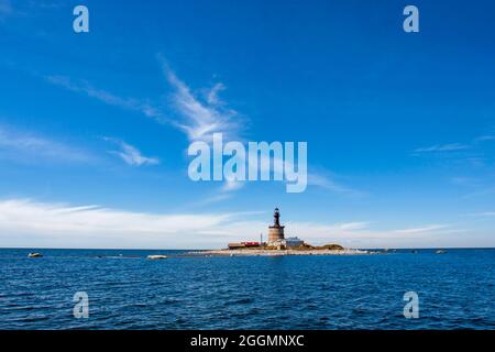 Buildings and the lighthouse on small remote Keri island at the Baltic Sea in Estonia, Europe Stock Photo