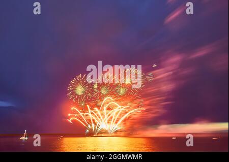 Colorful fireworks on the black sky background Stock Photo