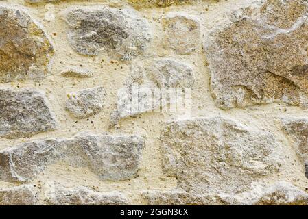 The texture of the wall, stones in the doggy space. Stock Photo