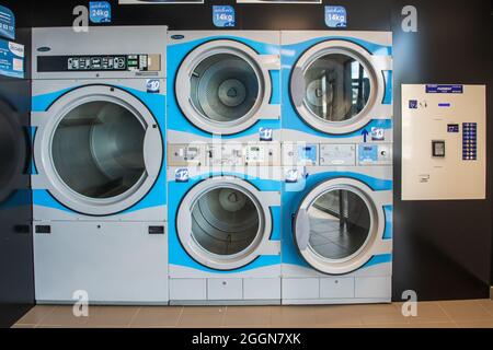 Row of washing machine of laundry business in the public store. Stock Photo