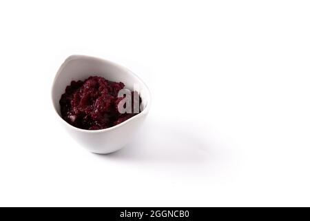 Beetroot sauce in white bowl isolated on white background Stock Photo