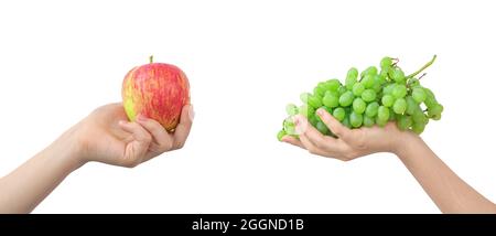 Red apple and green grape mix, fruits isolated on a white background, healthy food in hand Stock Photo