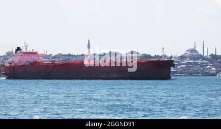 Container ship carrying goods between ports Stock Photo