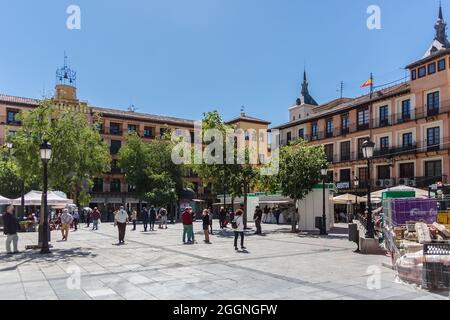 Toledo Spain - 05 12 2021: General view at the Zocodover Plaza with a street market and people visiting, a square of the city of Toledo, in the autono Stock Photo