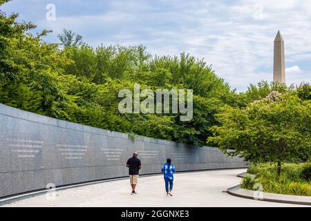 Washington DC - August 20, 2021: Couple visiting the Martin Luther King Jr. Memorial a monument to the civil rights leader located in Washington, D.C. Stock Photo