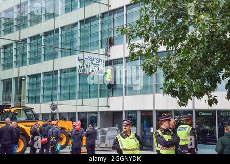 London, United Kingdom. 2nd September 2021. Two HS2 protesters scaled Marsh Insurance offices in the City of London, demanding they stop insuring the HS2 (High Speed 2) railway system. (Credit: Vuk Valcic / Alamy Live News) Stock Photo