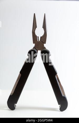 multi purpose tool on white background  ,camping and survival tools for emergency use Stock Photo