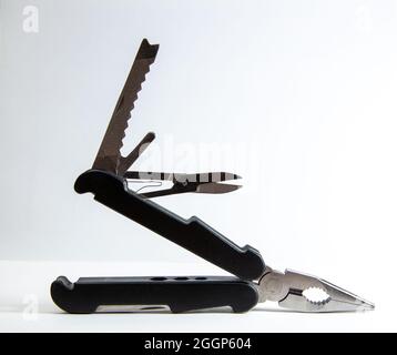 multi purpose tool on white background  ,camping and survival tools for emergency use Stock Photo