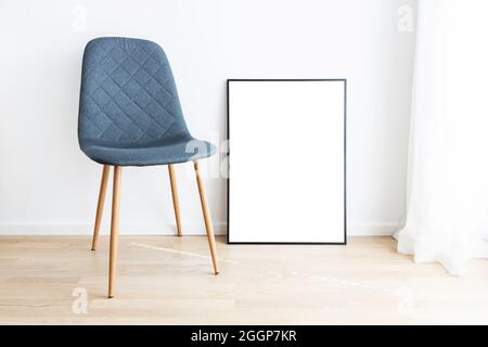 Modern interior with mockup frame and chair. Stock Photo