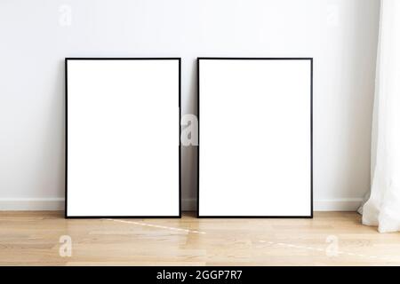 Modern neutral room with mock up frames. Stock Photo