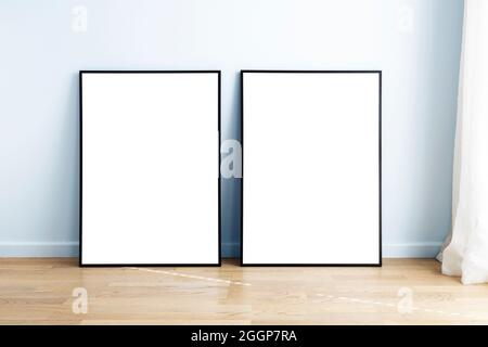 Modern neutral room with mock up frames. Stock Photo