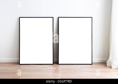 Modern neutral room with mock up frames. Stock Photo