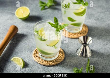 Boozy Cold Refreshing Mint Mojito with Lime and Rum Stock Photo