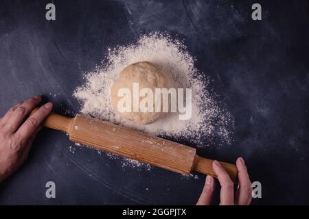 Table with baking products and tools. Culinary, baking concept. Stock Photo