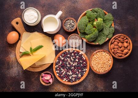 Products rich in calcium on dark background. Healthy food. Top view Stock Photo