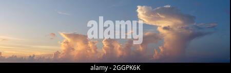 Beautiful colored cloudy evening sky. Sky with clouds at sunset. Abstract sky background. Stock Photo