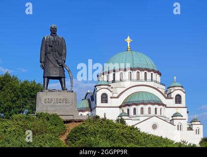 Karadjordje Monument with the Church of Saint Sava in the background, Karadjordjev Park, Belgrade, Serbia Stock Photo