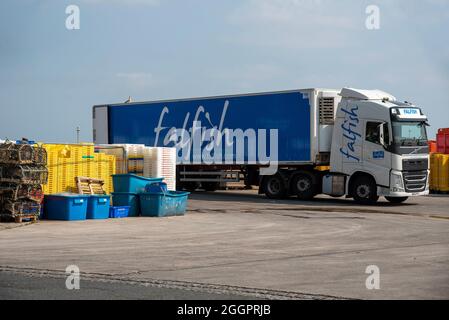 Newlyn, Cornwall, England, UK. 2021. Newlyn Harbour fish market the largest fishing port in England, UK. Lorry on site to transport fish. Stock Photo