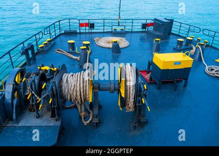 Ferry deck. Drum with mooring rope close up. Stock Photo