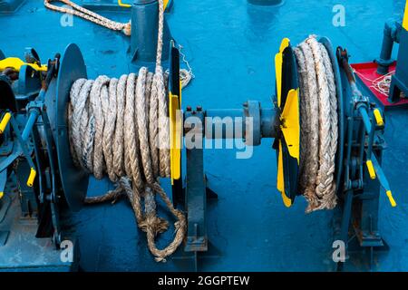 Ferry deck. Drum with mooring rope close up. Stock Photo