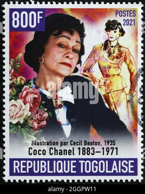 Coco Chanel portrait on postage stamp Stock Photo