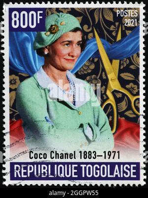 Famous stylist Coco Chanel on postage stamp Stock Photo