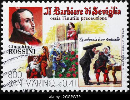 Gioacchino Rossini and his opera The barber of Seville on stamp Stock Photo