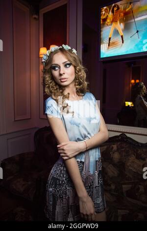 Odessa, Ukraine April 26, 2014: Ministerium night club. Girl smiling and posing on cam during concert in night club party. Man and woman have fun at c Stock Photo