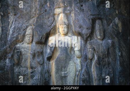 Sri Lanka. Ella. Dhowa Rock Temple. Carved rock relief figures. Stock Photo