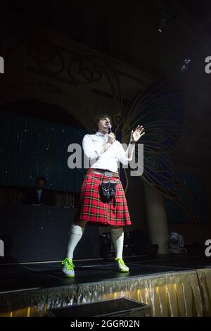 Odessa, Ukraine April 26, 2014: Artist performs songs from stage during concert at nightclub. Artist on clab stage during night party. Stock Photo