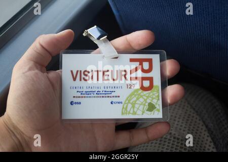 KOUROU, FRENCH GUIANA - AUGUST 4, 2015: Visitors badge at Centre Spatial Guyanais (Guiana Space Centre) in Kourou, French Guiana Stock Photo