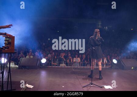 Odessa, Ukraine July 11, 2019: Many spectators at concert. crowd of visitors to concert has fun and shoots what is happening on smartphones. Fans at c Stock Photo