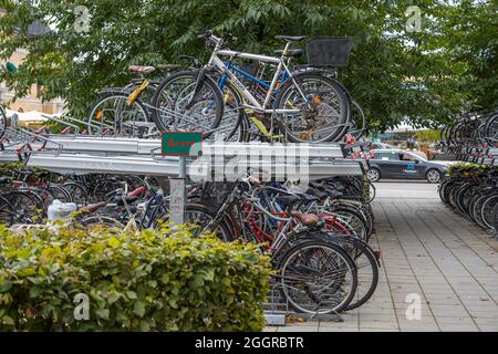 Beautiful view of parking for bicycles in Uppsala, Sweden, Europe. Healthy lifestyle concept. Stock Photo