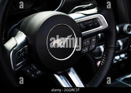 The details of interior of sports car Ford Mustang (sixth generation), close-up. The exhibition of 'US Car Classics'. Stock Photo