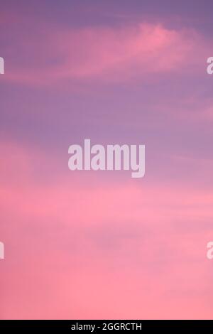 Gorgeous Gradient Purple and Pink Cloudy Sky with Sunset Afterglow Stock Photo
