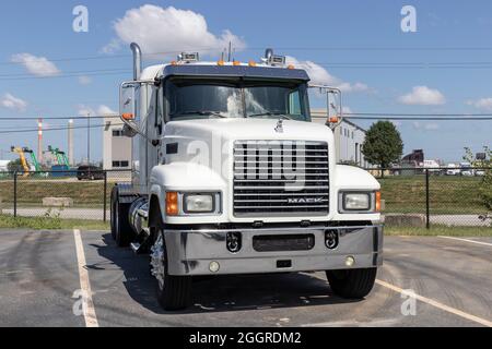 Indianapolis - Circa September 2021: Mack Semi Tractor Trailer Trucks Lined up for sale. Mack Trucks is owned by Volvo. Stock Photo