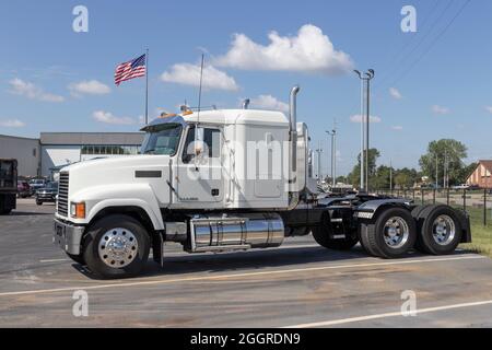 Indianapolis - Circa September 2021: Mack Semi Tractor Trailer Trucks Lined up for sale. Mack Trucks is owned by Volvo. Stock Photo