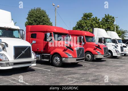 Indianapolis - Circa September 2021: Volvo Semi Tractor Trailer Trucks Lined up for Sale. Volvo is one of the largest truck manufacturers. Stock Photo