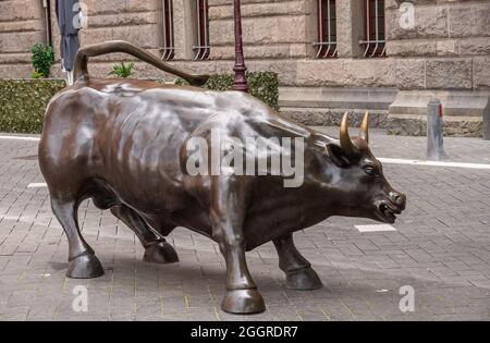 Amsterdam, Netherlands - August 14, 2021: Closeup of raging bull statue in front of stock exchange. Stock Photo