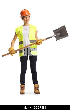 Full length portrait of a female worker holding a shovel isolated on white background Stock Photo