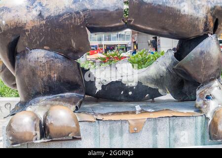 MEDELLIN, COLOMBIA - SEPTEMBER 1, 2015: Detail ofBird of Peace statue in San Antonio park by Fernando Botero. It was destroyed by bomb explosion in 19 Stock Photo