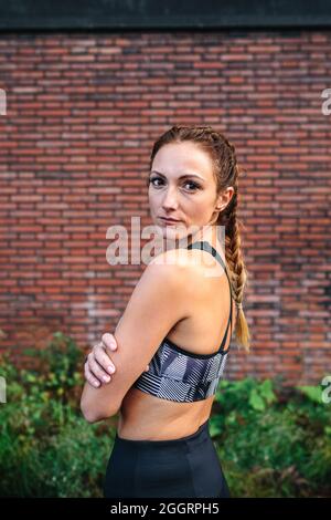 Sporty woman with boxer braids posing Stock Photo